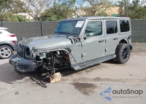 2022 Jeep Wrangler 4Xe Unlimited Sahara 4X4 z USA, uszkodzony, nr VIN 1C4JJXP63NW103051